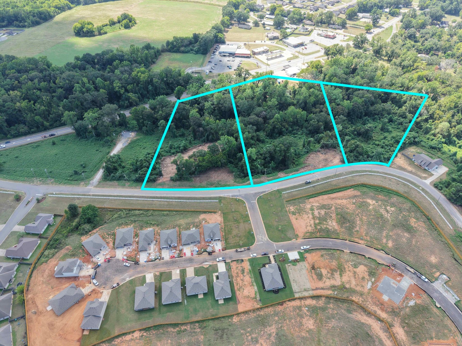 Aerial of the three adjoining Cherokee Bend homesites with lot lines marked