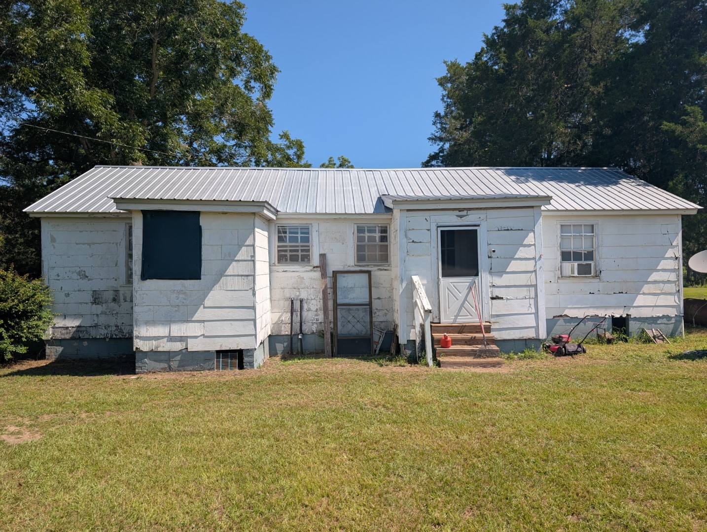 The rear of the residence and lawn
